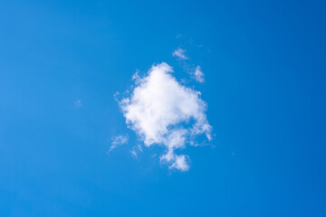 Fototapeta na wymiar Lonely fluffy cloud in the blue sky. Sky replacement.