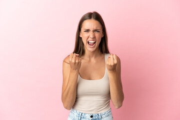 Young woman over isolated pink background frustrated by a bad situation