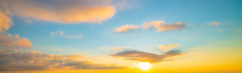 Clouds and yellow sky,The sun shining through low cloud,sunrise with clouds, light rays and other atmospheric effect