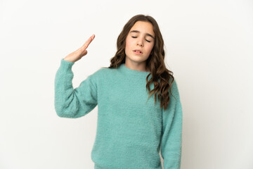 Little caucasian girl isolated on white background with tired and sick expression