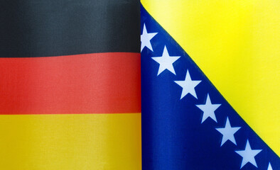 fragments of the state flags of Germany and Bosnia and Herzegovina close-up
