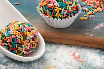 Focus on colorful Brazilian brigadier (brigadeiro).