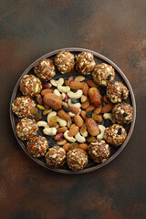 Indian sweet dry fruits and nuts laddu, which is a traditional, healthy, nutritious and popular...