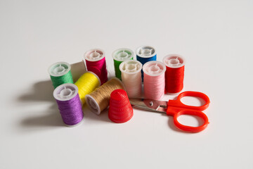 Fototapeta na wymiar a set of sewing threads bobbin craft material hobby color