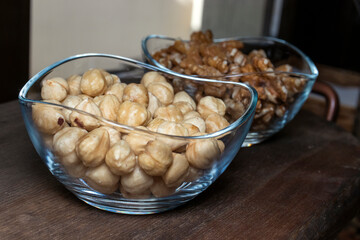 close up of a pile of hazelnuts, a bowl of hazelnuts.