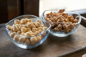 close up of a pile of hazelnuts, a bowl of hazelnuts.