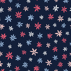 Cute multicolored ditsy seamless repeat pattern. Random placed, vector floral all over print on dark blue background.