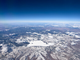 Aerial view of mountains in winter snow in southwest USA
