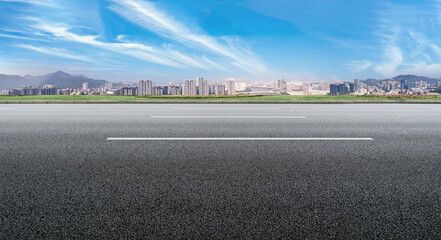 Fototapeta premium Freeway skyline and financial district modern buildings