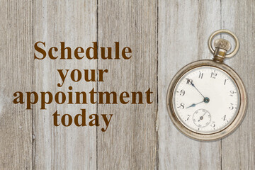 Schedule your appointment now message with old retro pocket watch