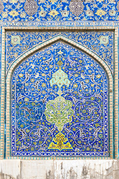 Esfahan, Iran &ndash; April 13, 2019: Wall decorated with polychrome tiles, Masjed-e Imam Mosque, Maydam-e Iman square, Esfahan, Iran