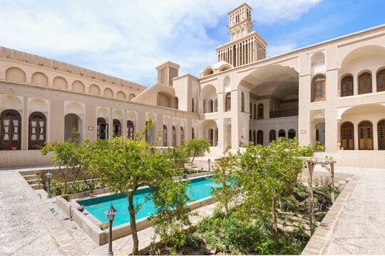 Abarkook, Iran &ndash; April 10, 2019: Courtyard and wind catcher, Aghazadeh Mansion, Abarkook, Yazd Province, Iran