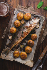 Sea Bass Stuffed with Sorrel and Baked with Potatoes
