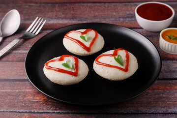 valentines day special idli idly with love red heart South Indian breakfast Valentine's Day red and green hearts on Indian food. V-day. Idli Hearts food art