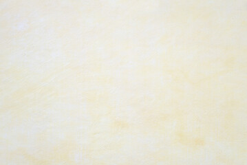 concrete wall structured with spatula technique, light beige