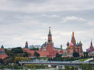 Obraz premium Beautiful view of Red Square with Moscow Kremlin and St. Basil's Cathedral in rainy summer. This is main tourist destination in Moscow. Beautiful panorama of heart of city.