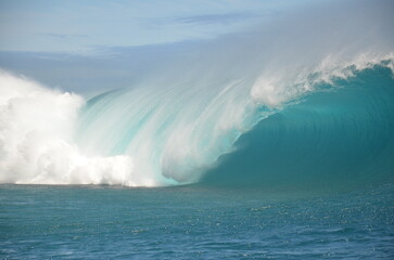 The wave of Teahupoo in Tahiti forms a perfect tube for surfing.