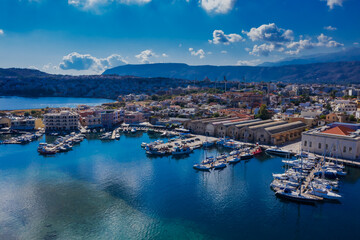 Fototapeta na wymiar old Venetian harbor of Chania bay on a sunny morning, Crete island. Greece
