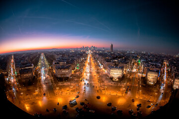 Paris, France, January 14 2022: Paris streets and boulevard view from above during twilight.
