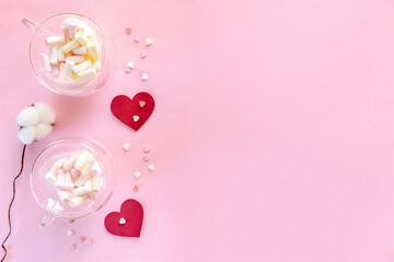 two cups full of marshmallow, hearts shaped decor, cotton branch, colorful red white pink sprinkles, sweet confetti, decoration for valentine day, womens day, copy space mock up, love background