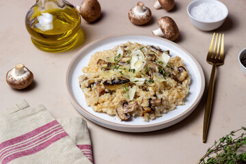 Risotto with mushrooms, cheese and thyme. Vegetarian food. Italian food.