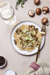 Risotto with mushrooms, cheese and thyme. Vegetarian food. Italian food.