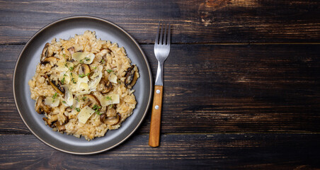 Risotto with mushrooms, cheese and thyme. Vegetarian food. Italian food.