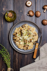 Risotto with mushrooms, cheese and thyme. Vegetarian food. Italian food.