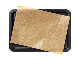 Baking sheet with brown parchment paper isolated on a white background. Empty oven tray for baking...