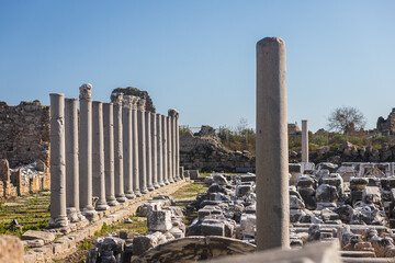 Fototapeta premium An antique ruined city of columns.Ruin. View of the ancient city in Side, Turkey.