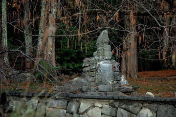 Mystical forest. Japanese garden. Sculpture made of stones.