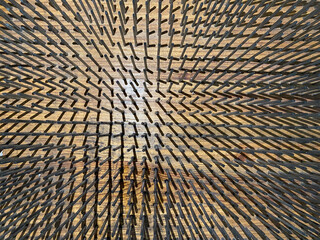 Beautiful background with metal nails driven into a wooden board. Lots of metal nails
