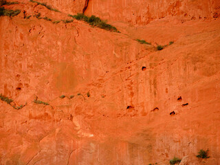 Red and orange sandstone cliffs at sunrise in Garden of the Gods Colorado Springs