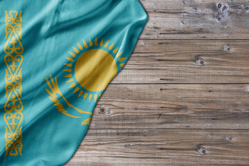 Wooden pattern old nature table board with Kazakhstan flag