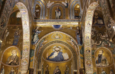 Fototapeta na wymiar Interior of The Palatine Chapel with its golden mosaics, Palermo, Sicily, Italy in Palazzo dei Normanni in Palermo, Sicily, Italy.