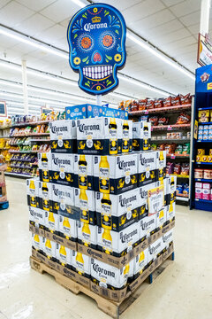 Woodland, CA/USA 11/1/2019 Pile of corona brand mexican beer boxes for sale in a supermarket aisle