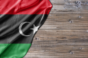 Wooden pattern old nature table board with Libya flag