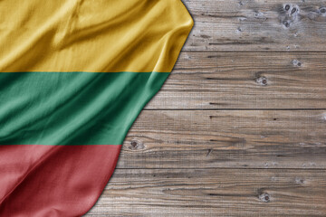 Wooden pattern old nature table board with Lithuania flag