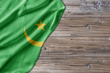 Wooden pattern old nature table board with Mauritania flag
