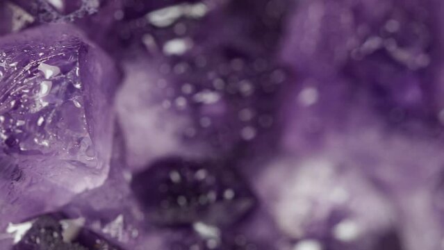 Macro purple texture and background with amethyst crystals.
