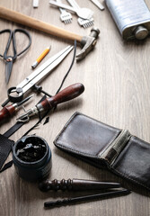 Concept of leather handcraft instruments. Colouring genuine leather