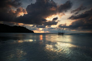 Fototapeta na wymiar Sunrise on a beach of Phu Quoc Vietnam. 