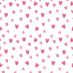 Seamless background with pink valentines on a white background