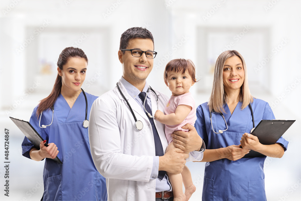 Sticker team of pediatricians with a baby