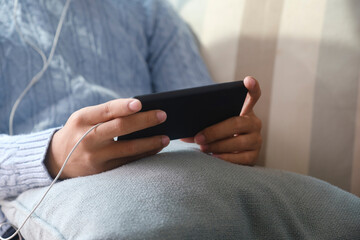 Close up of man using mobile phone.