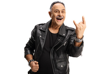 Smiling mature man in a leather jacket gesturing sign of the horns