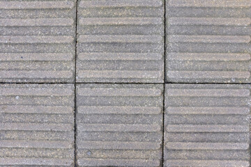 Tactile paving designed to help people with visual impairment to enable them to know their location...