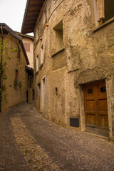 Fototapeta na wymiar A quiet street in winter in the small town of Limone sul Garda on the north east shore of Lake Garda, Brescia province, Lombardy, Italy 