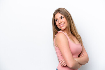 Fototapeta premium Young caucasian woman isolated on white bakcground looking to the side and smiling