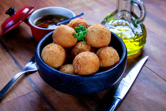 Fried rice balls. Traditional from Brazil where it is called Bolinho de arroz.